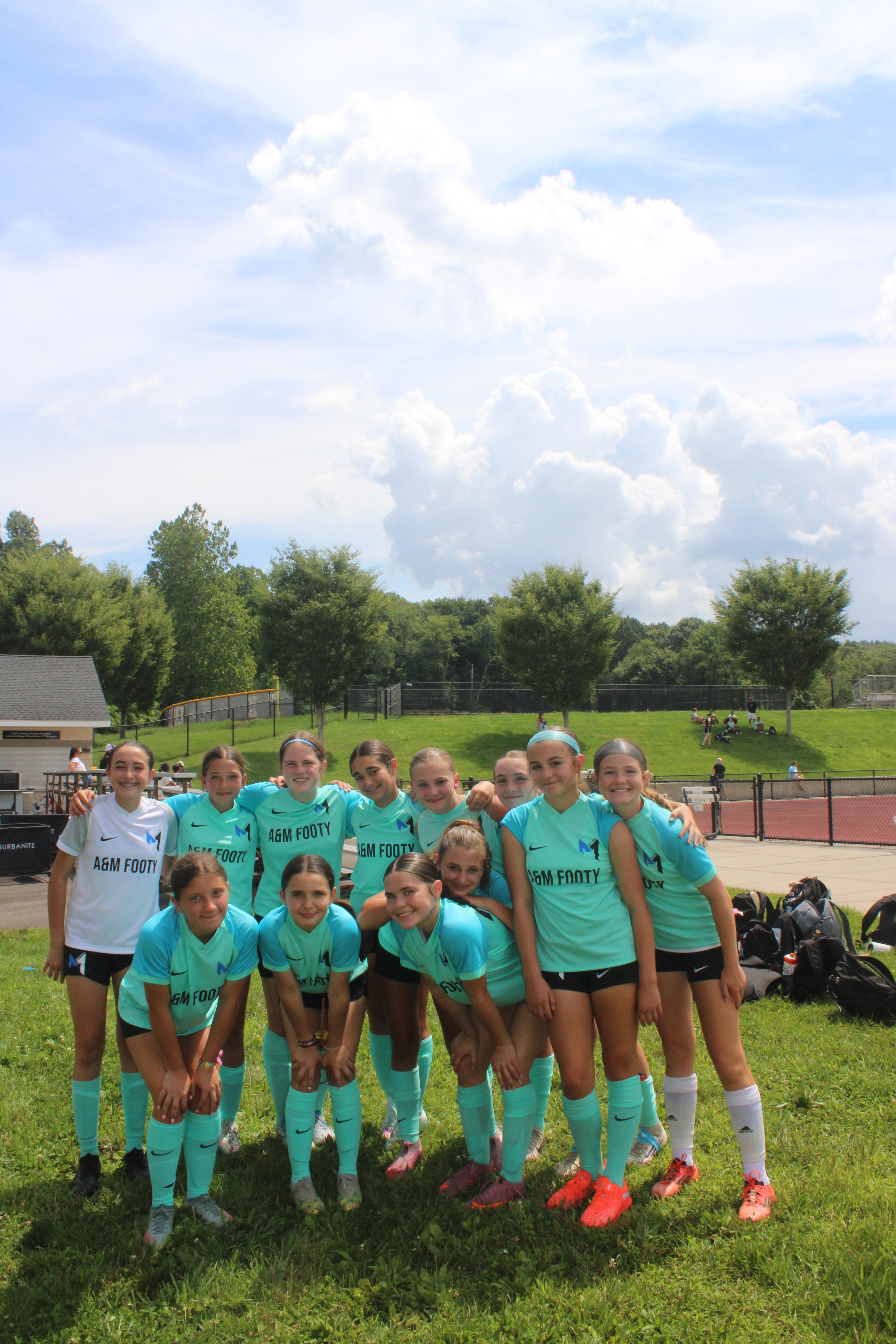 A&M Footy team together at a tournament